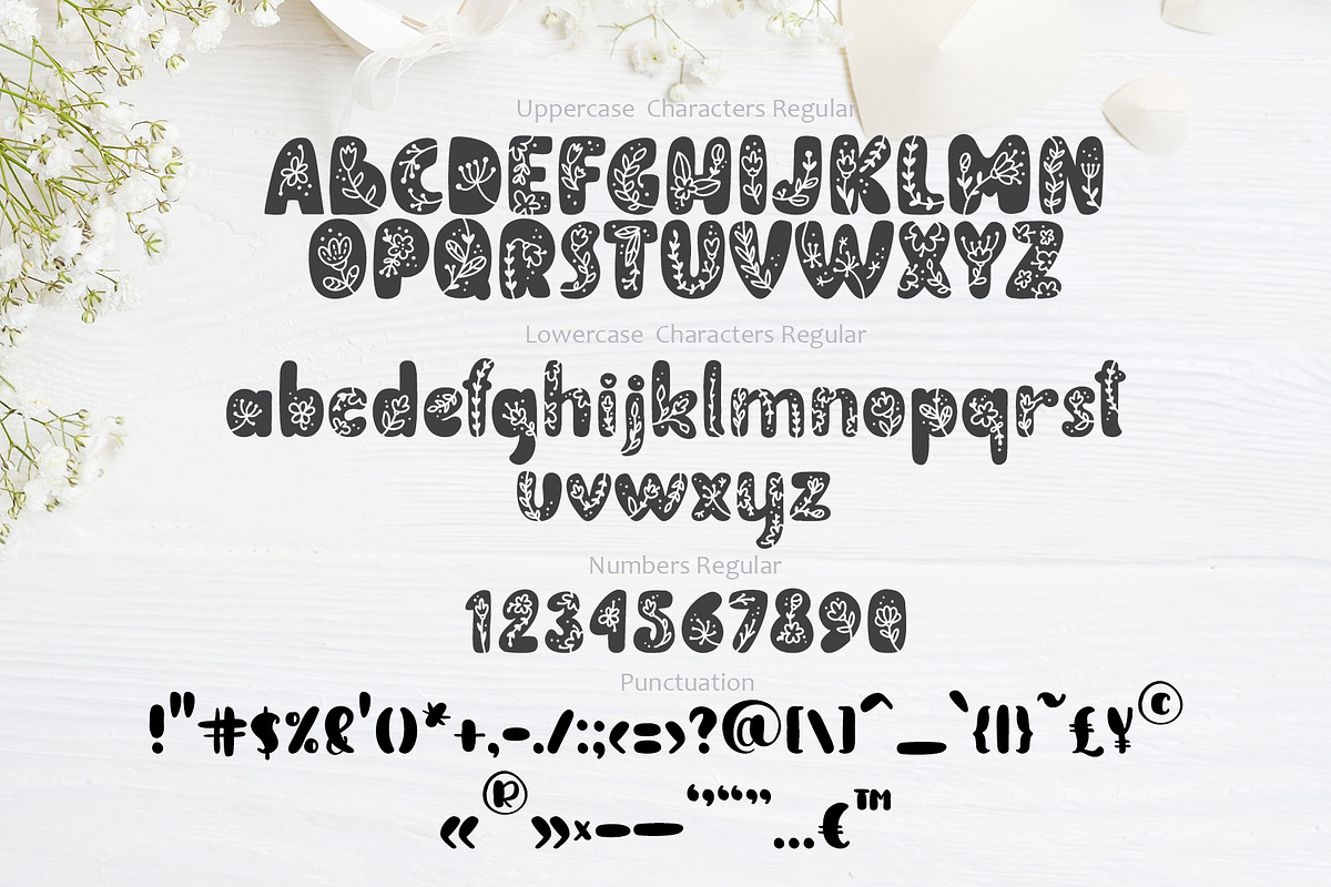 Flower Hand Drawn display Font, a Script Font by Happy Letters (Photo 8 of 10)