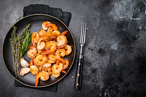 Appetizing grilled shrimp prawns served on a platter, perfect fo, a Food & Drink Photo by composter-box@mail.ru
