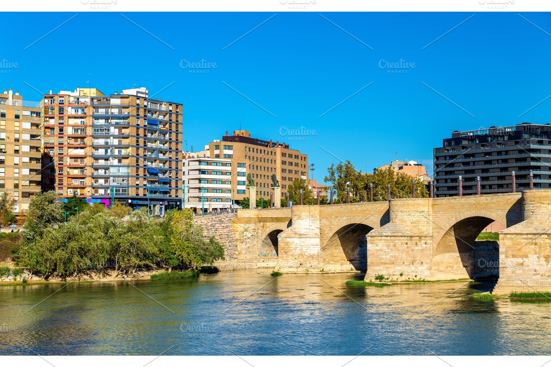 Puente de piedra in zaragoza spain stock photo containing zaragoza and river, an Architecture Photo by Leonid Andronov