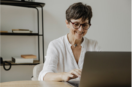 Smiling stylish mature business
