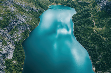 Dramatic aerial view of a tranquil l, a Photo by Iftikhar Alam