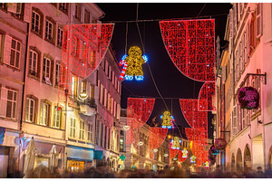 Christmas decorations on streets of Strasbourg, France, an Architecture Photo by Leonid Andronov