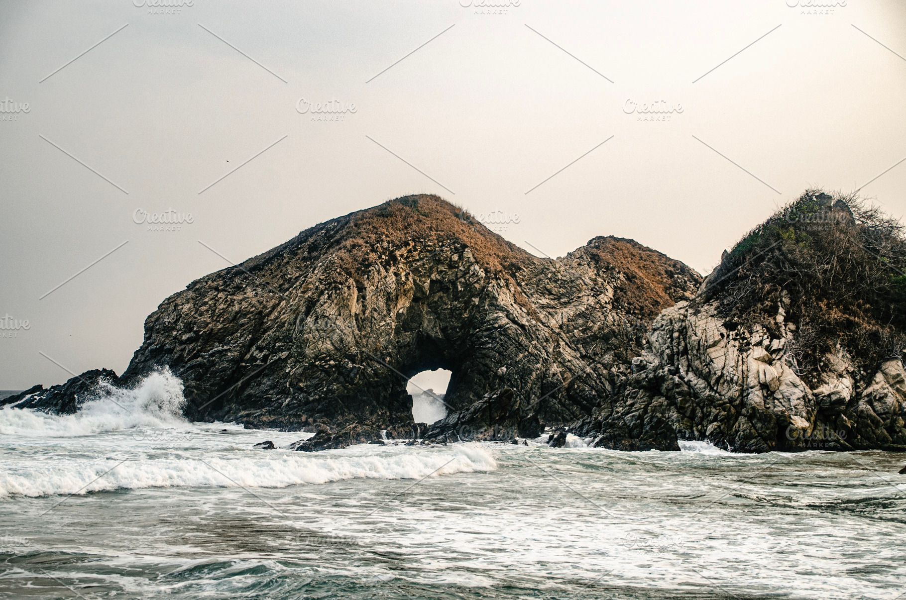 Mystical rock with gateway to ocean, a Wallpaper Photo by MUSTERIUM
