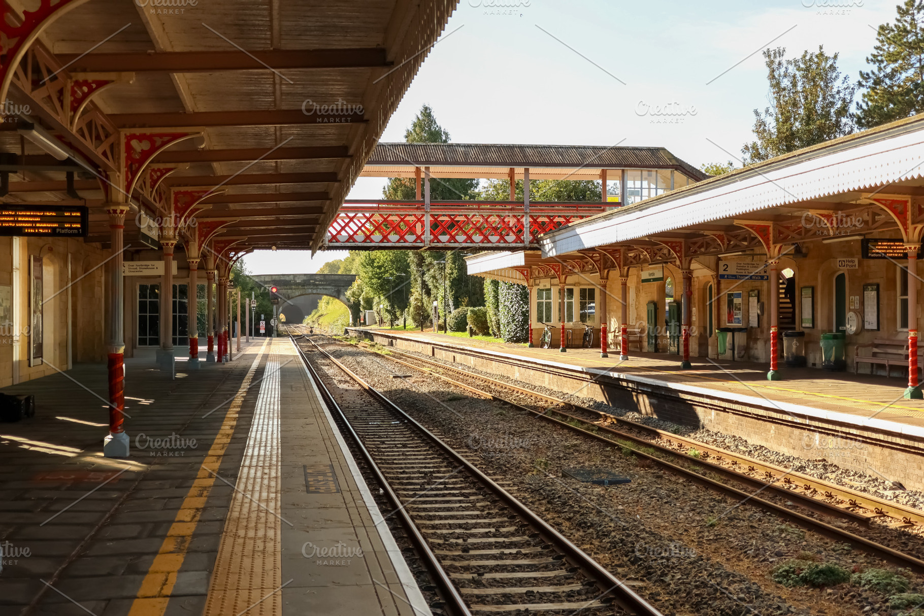 Victorian era train station platform and tracks, transport infra, a Photo by Studio ANNA