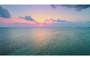 Colorful sunset reflecting on calm, a Nature Photo by Goinyk