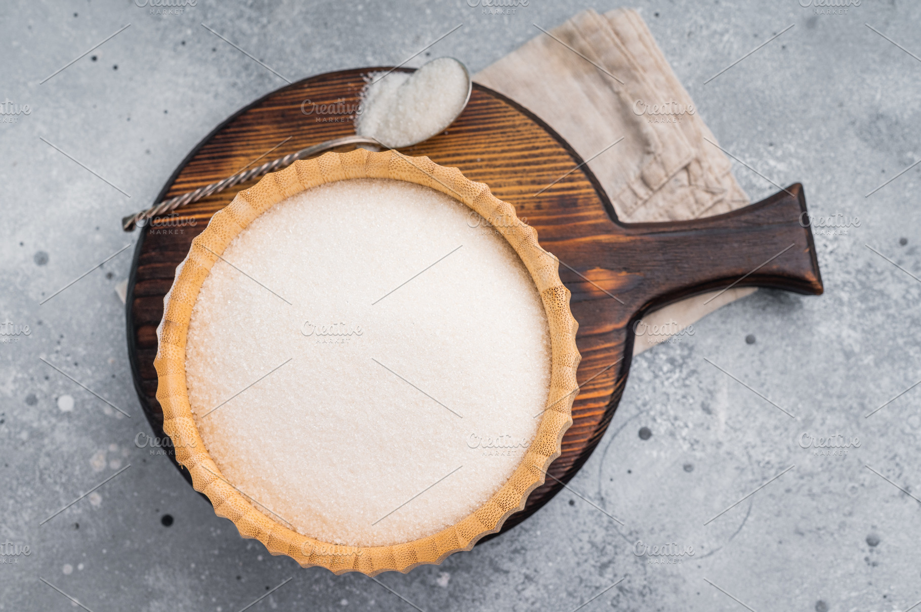 Versatile white sugar in a rustic bowl, ready to enhance dessert, a Food & Drink Photo by composter-box@mail.ru