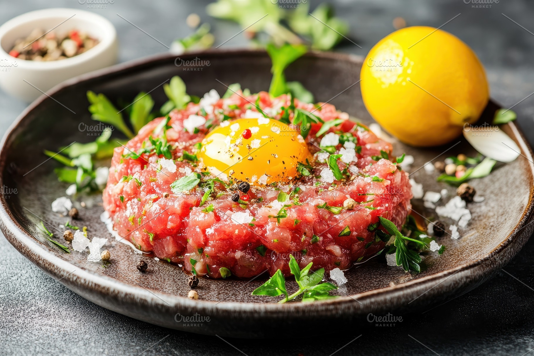 Beef tartar garnished with fresh, a Photo by Pavel_design