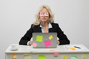 A lot of work concept. Tired young businesswoman having sleeping with stickers, a Photo by Prostock-Studio (Thumbnail 1 of 2)