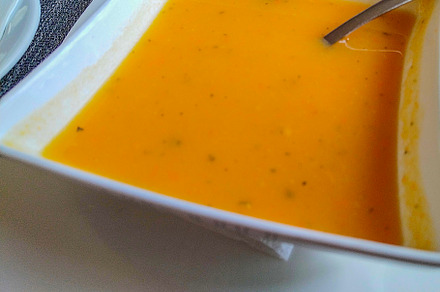 Creamy vegetable soup in modern bowl, a Food & Drink Photo by DanFLCreativo