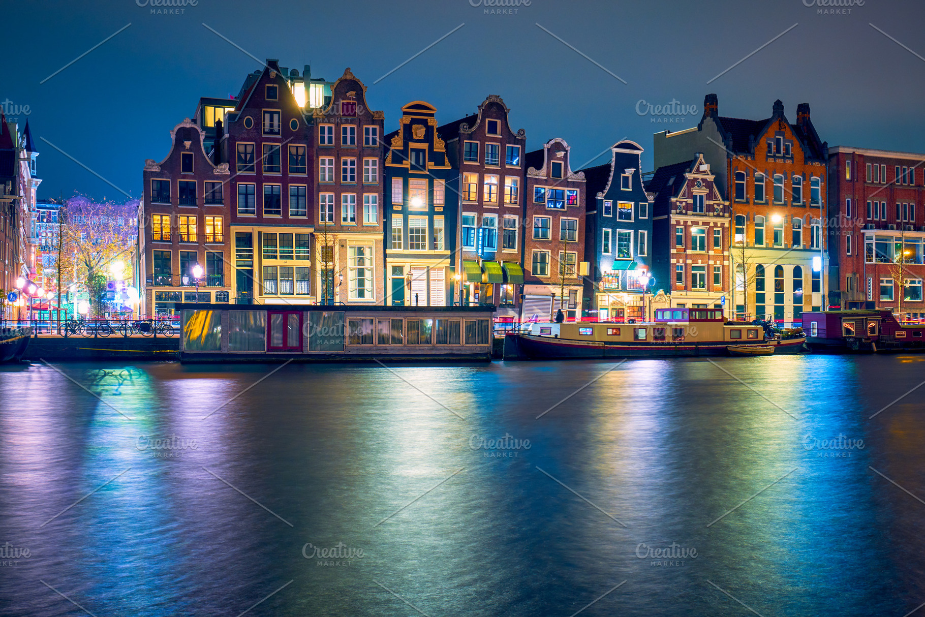 Amsterdam at night the netherlands stock photo containing building and night, an Architecture Photo by badahos