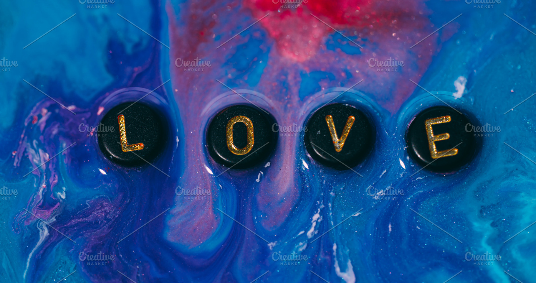 Love word paint spill glitter water, a Background Photo by Photo Drive Studio