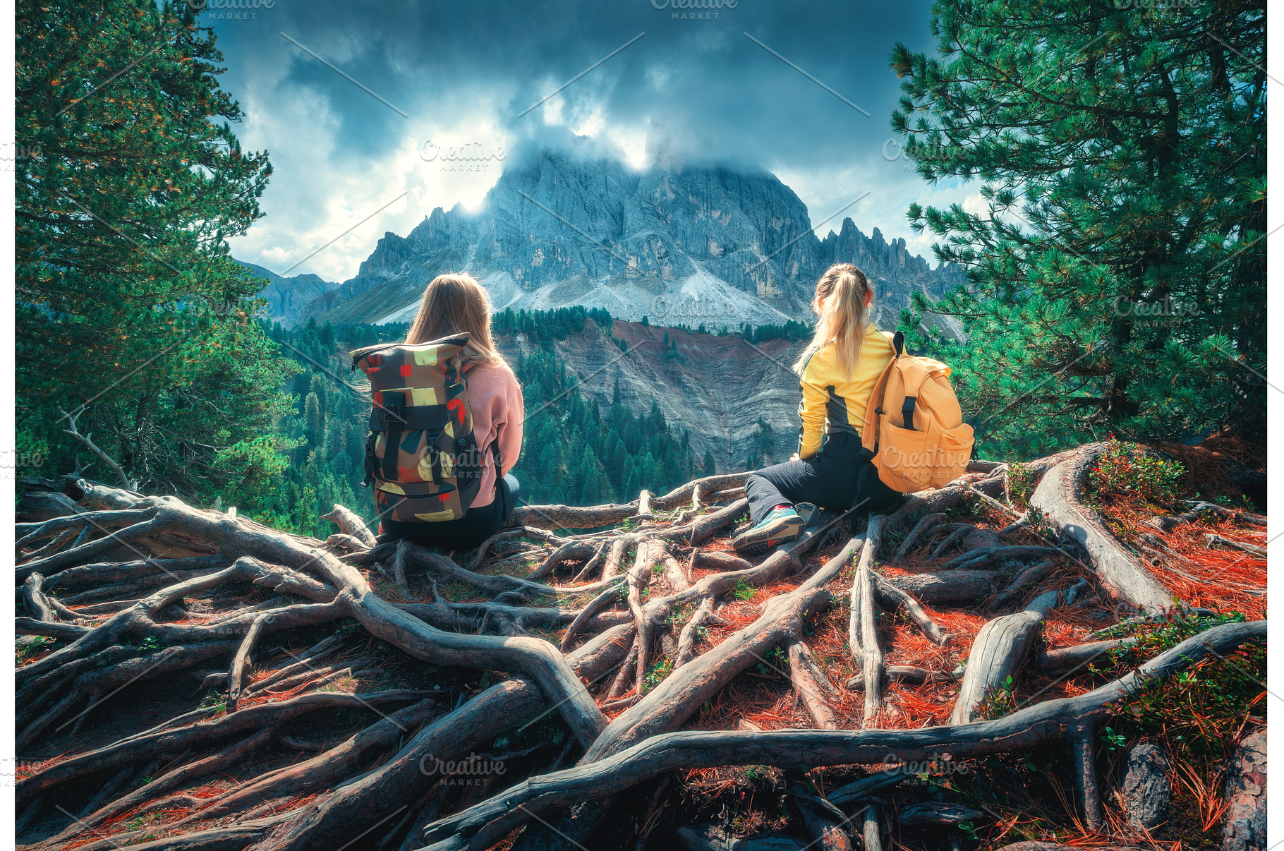 Two young women with backpacks, a Nature Photo by den-belitsky