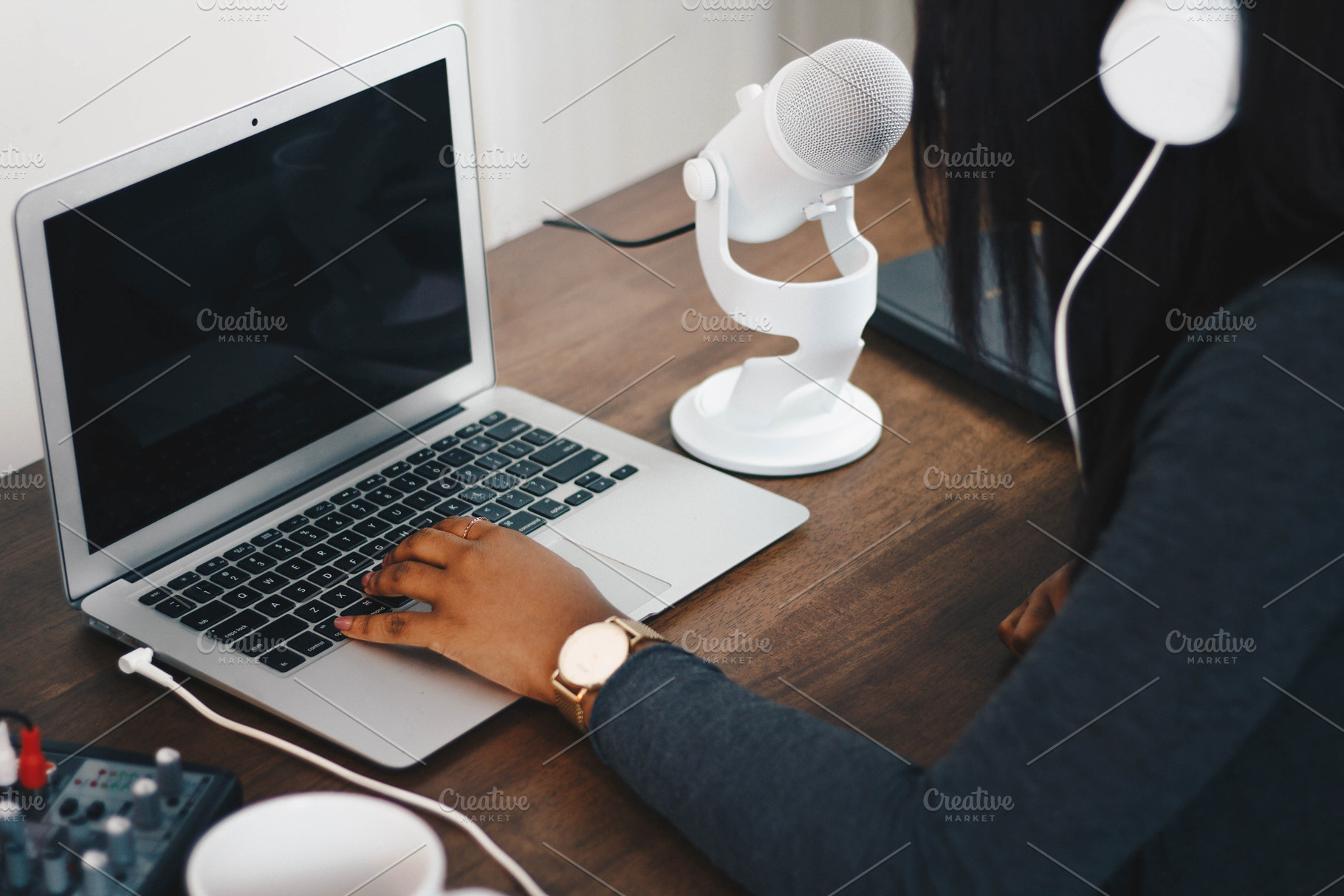 Black Woman Recording Podcast, a Business Photo by HUNCreative