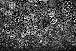 Steel cogwheels laying together tigh, an Industrial Photo by Photocreo Michal Bednarek
