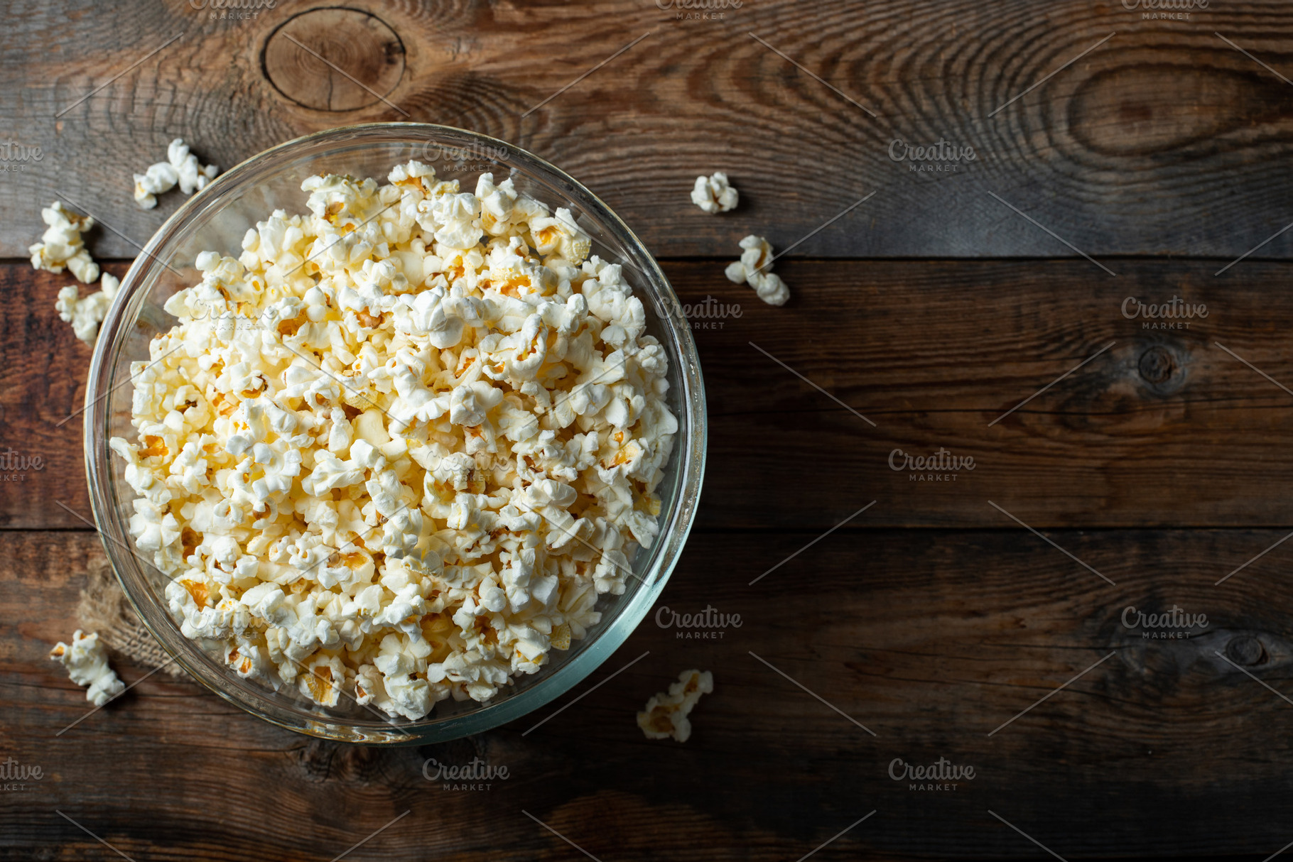 Popcorn on wood color background.Food and snack concepts ideas.Minimal style to, a Food & Drink Photo by Budarinphoto