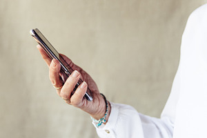 Close up of woman hand with smartpho featuring adult, business, and casual
