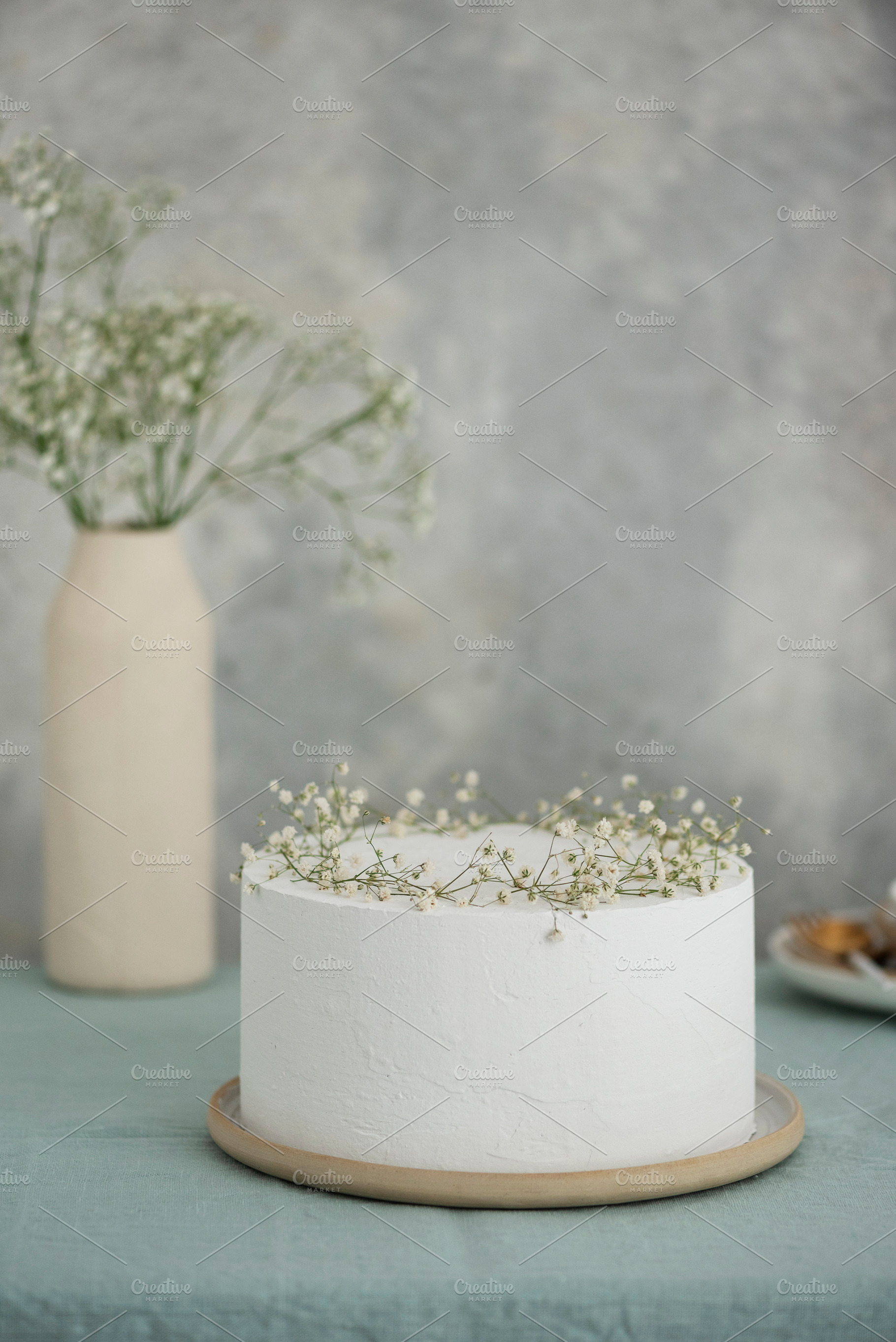 White wedding cake with flowers, a Food & Drink Photo by oxana.denezhkina