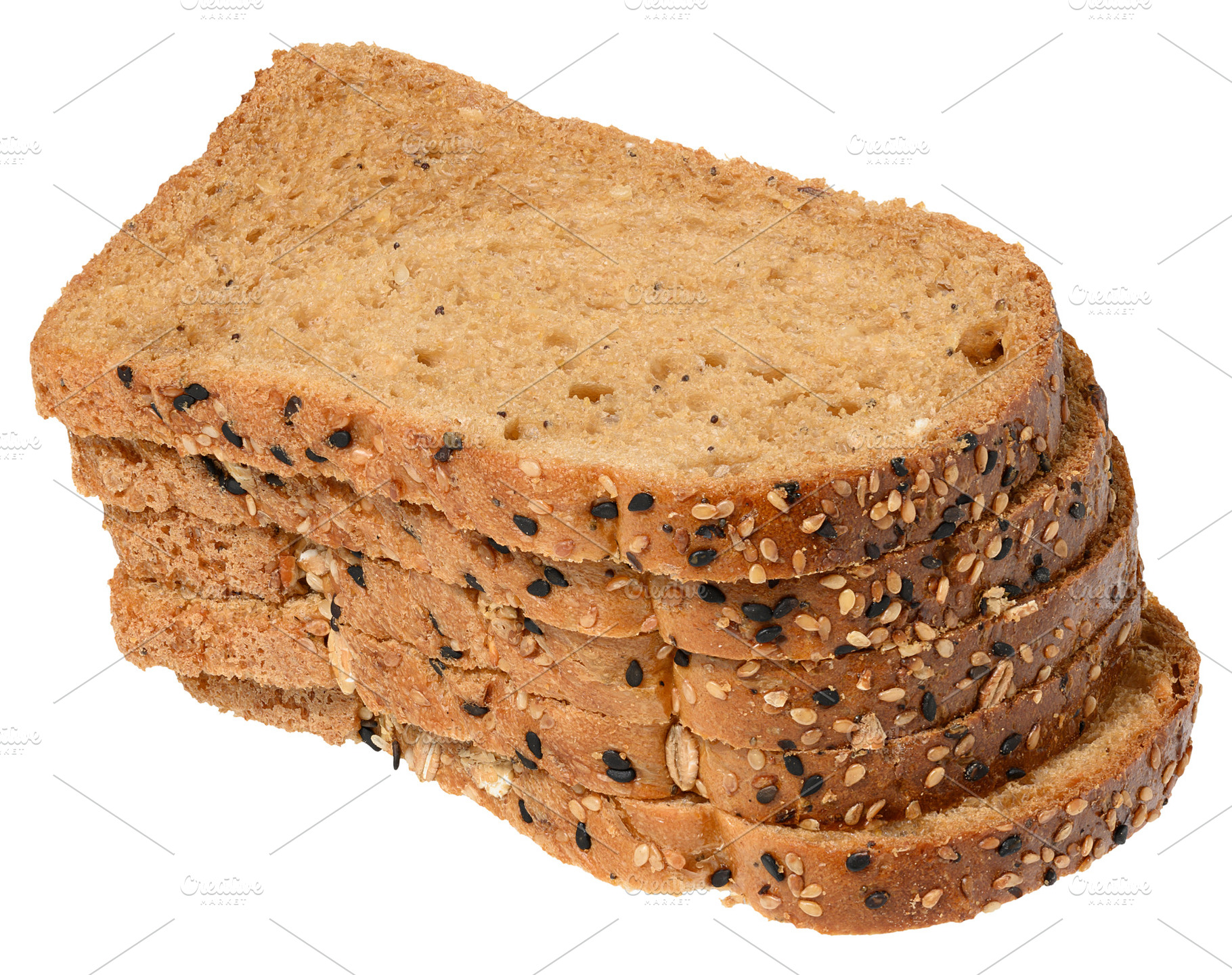 Slices of whole grain bread with seeds stacked. Product on isola, a Food & Drink Photo by ndanko