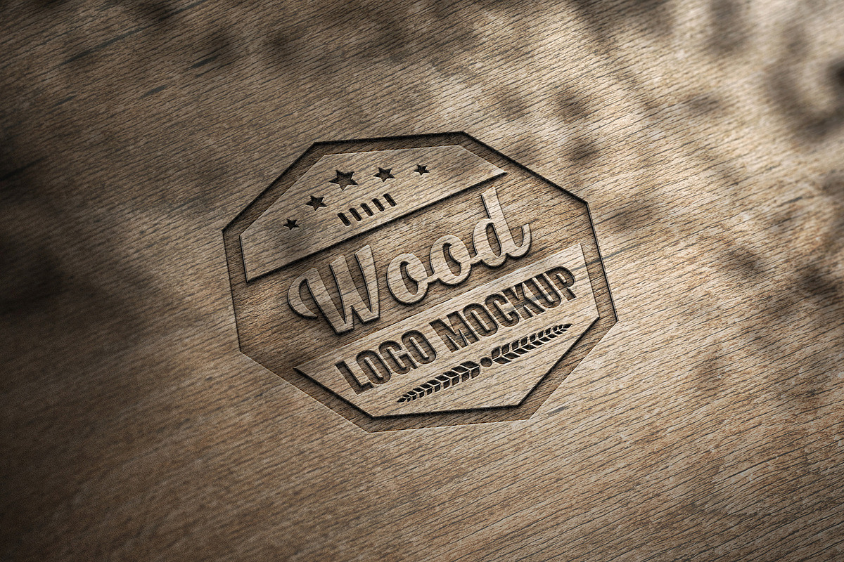 Woodcut Logo Mockup, a Product Mockup by Design Squad (Photo 1 of 5)