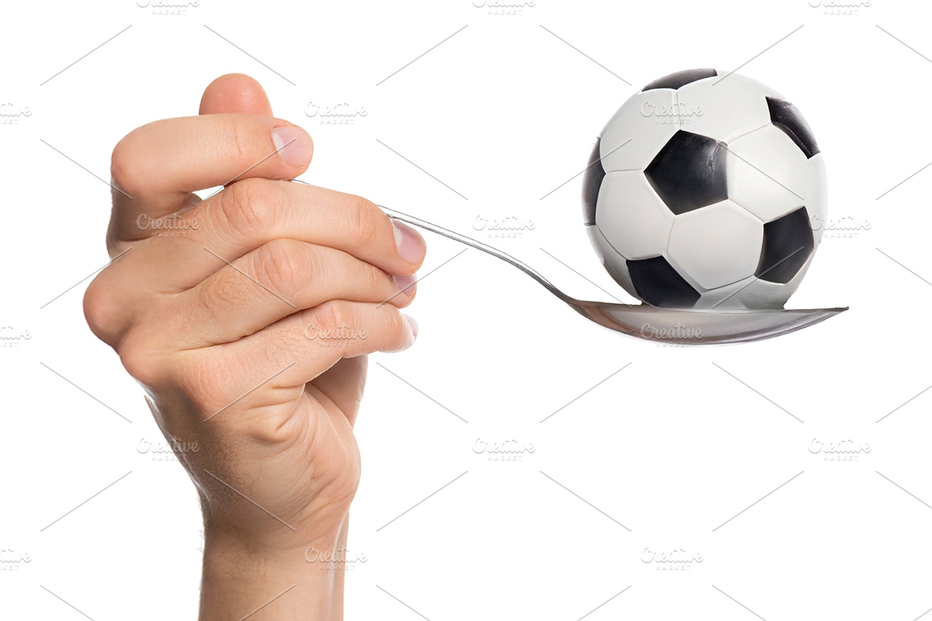 Consumerism concept of a hand holding a spoon holding a ball, a Sports & Recreation Photo by DanFLCreativo
