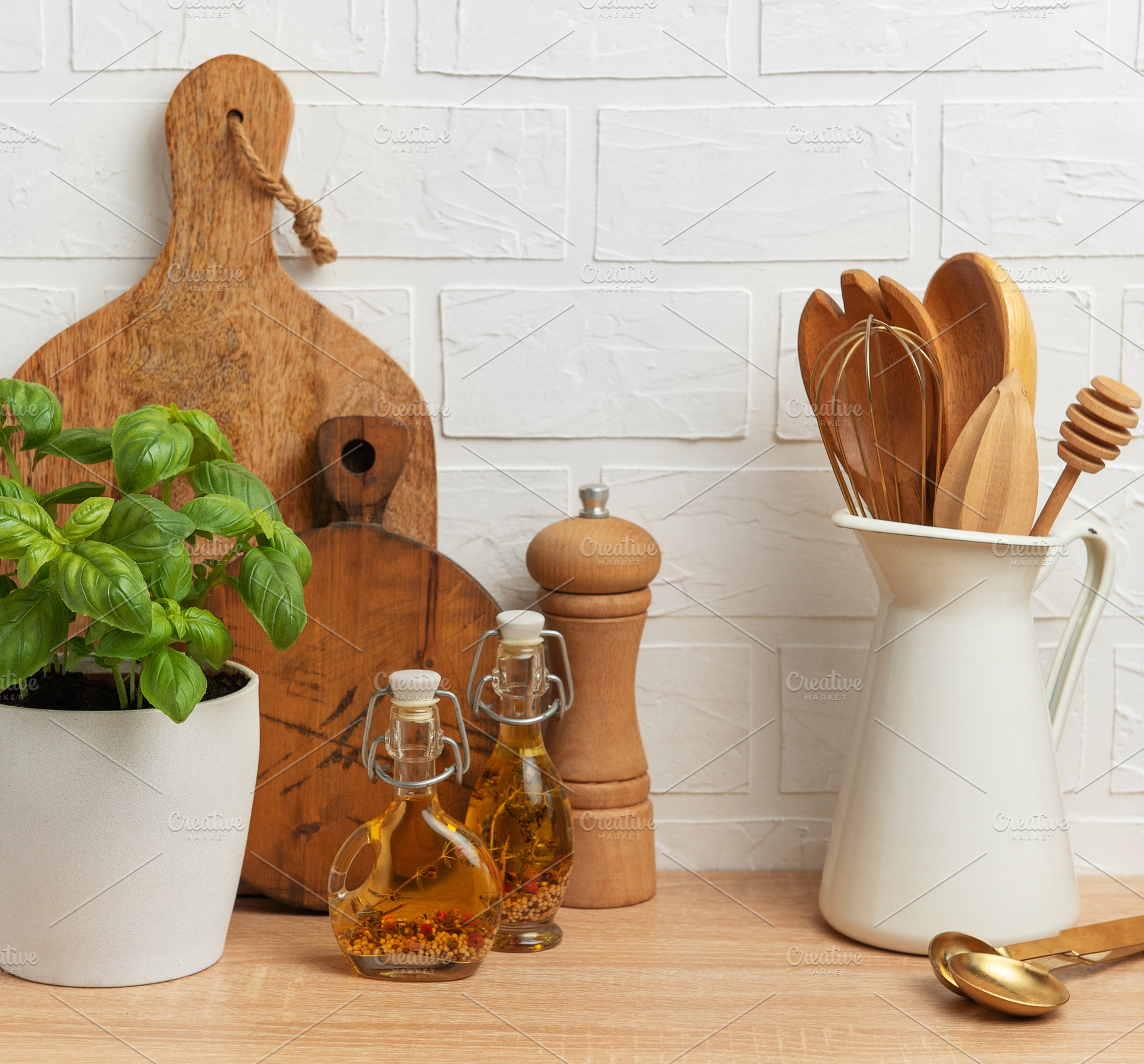 Rustic kitchen decor with herb and utensils, a Food & Drink Photo by Olena Rudo
