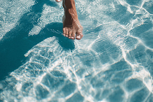 Close up of bare feet walking, a Person Photo by MistyDay