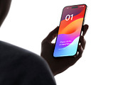 Phone 15 Pro Mockup in Hand, an iPhone Mockup by Asylab (Thumbnail 1 of 4)