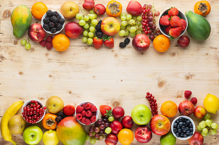 Rainbow fruits background stock photo containing top view and wooden