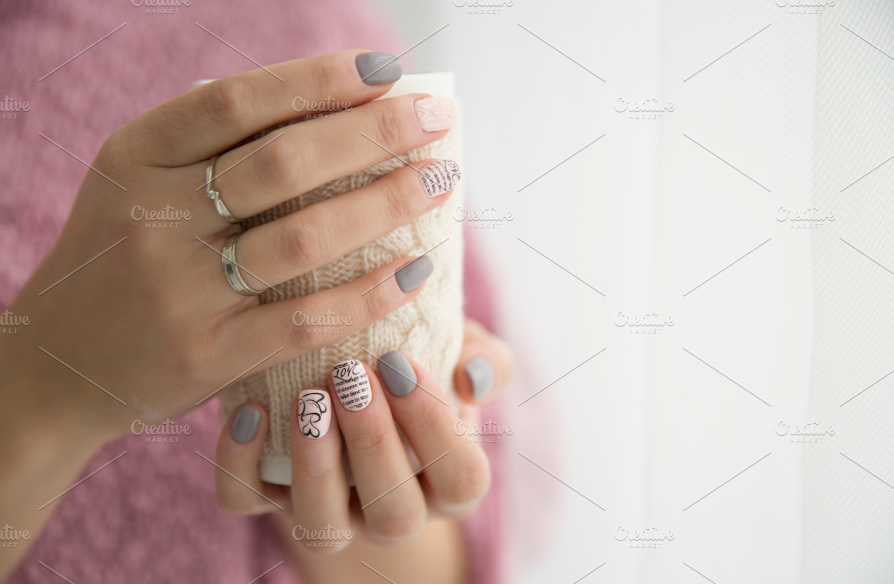 Woman's hands holding a cup containing mug, cup, and pink, a Beauty & Fashion Photo by Izdebska