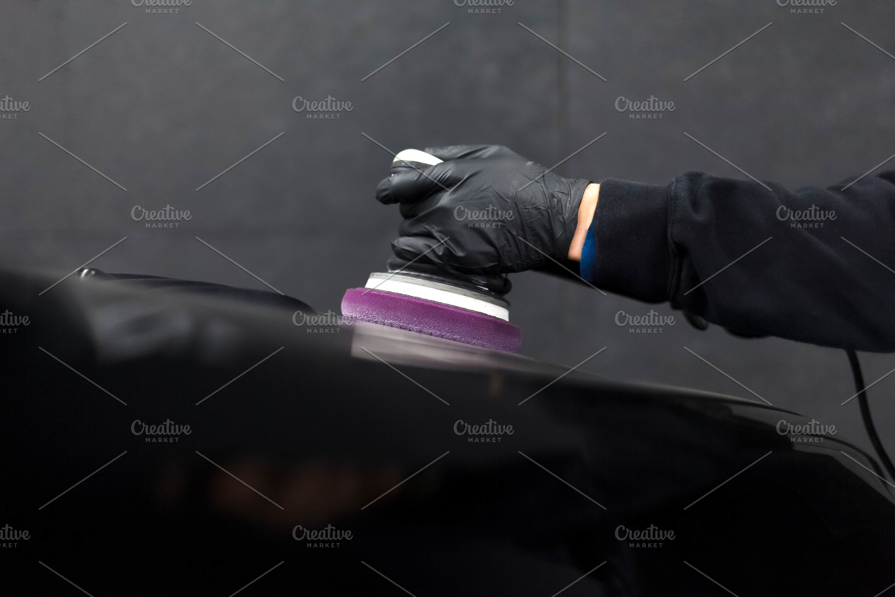Worker of deteyling center working, a Photo by borodai94