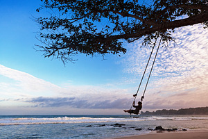 Happy girl have fun swinging high in featuring family, vacation, and happy