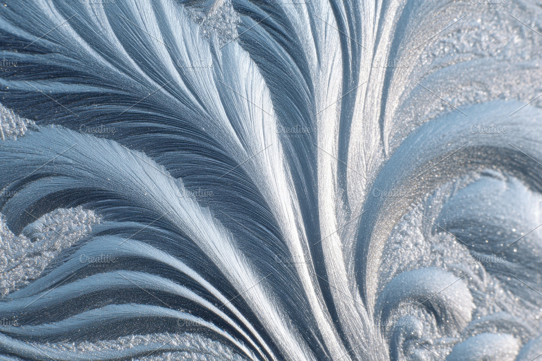 Intricate silver metallic patterns, an Abstract Photo by AlyaAnd
