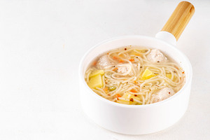 Homemade soup with chicken or turkey meatballs, a Food & Drink Photo by Rimma