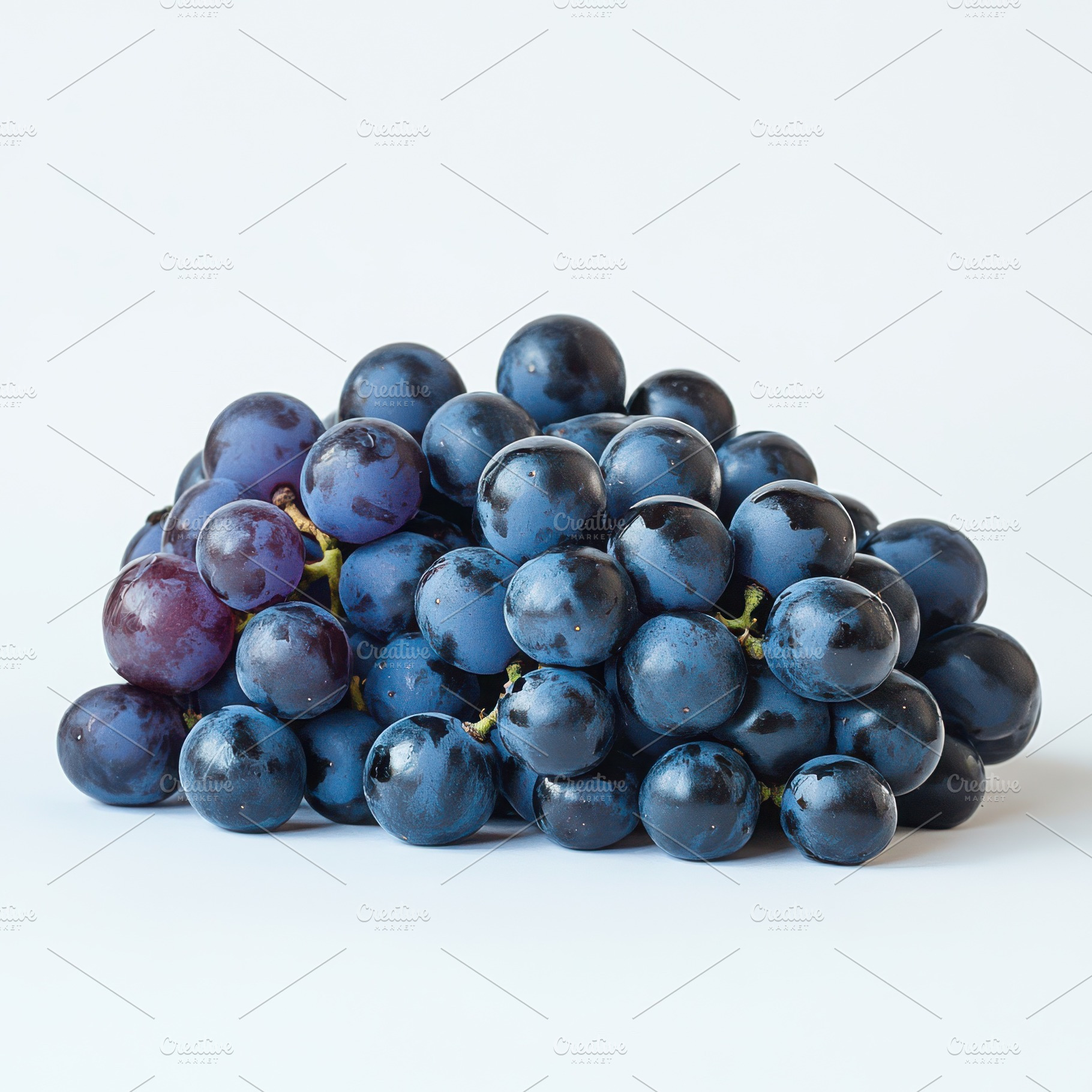 Pile of grapes varieties isolated on, a Food & Drink Photo by Pixeness Studio