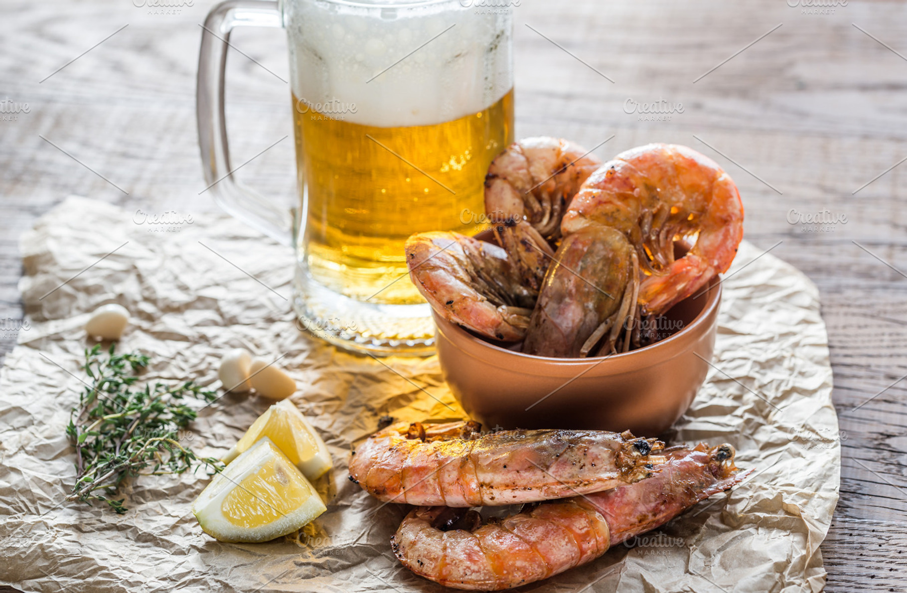 Fried shrimps with glass of beer containing 3, ale, and beer, a Food & Drink Photo by Alexander Prokopenko