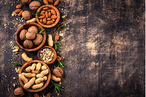 Assortment of different nuts and, a Food & Drink Photo by Yulia Furman