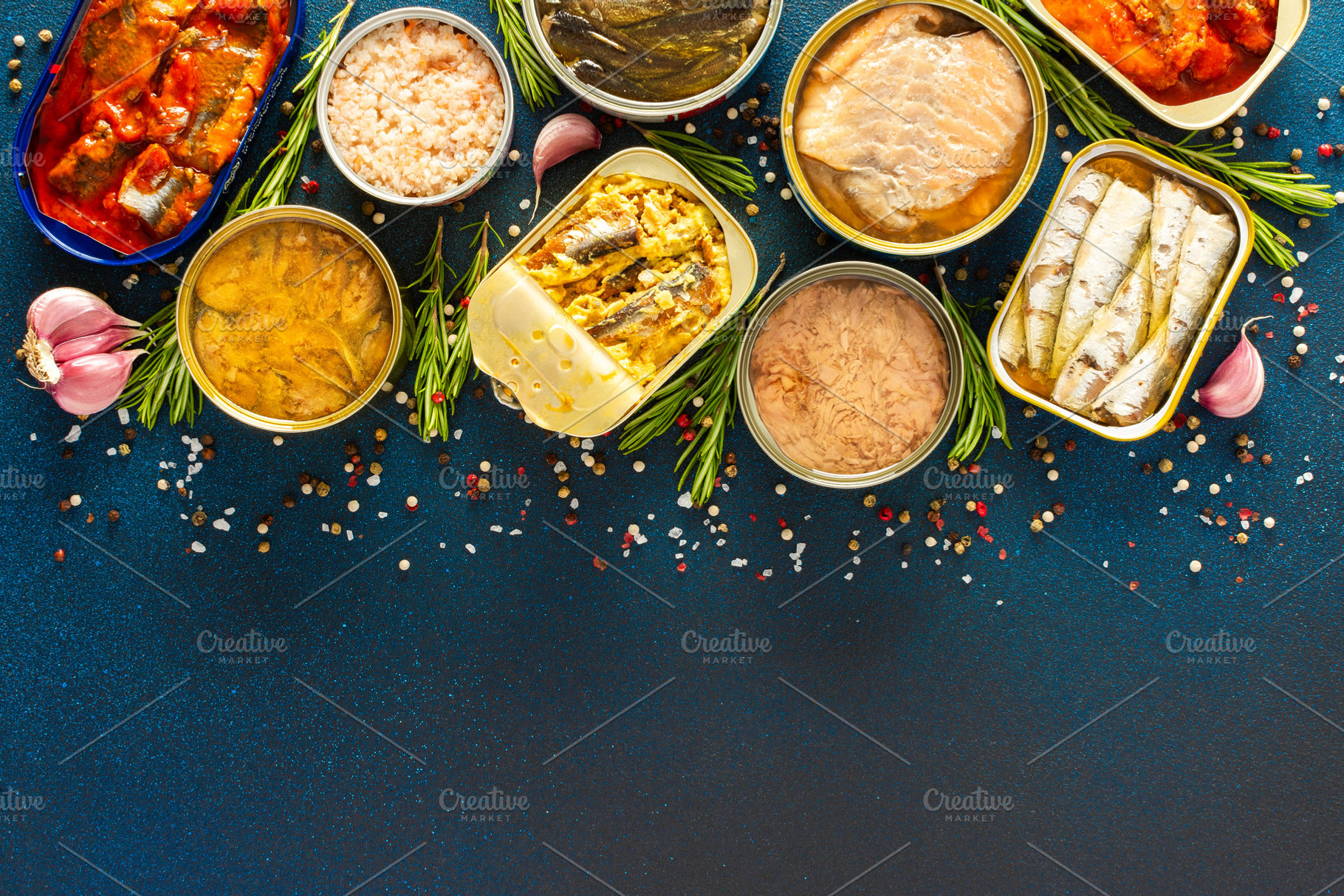 Different open tin cans, a Food & Drink Photo by Pundateam