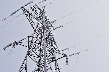 The frozen tower of a electric line featuring excellent, art, and reflection, an Industrial Photo by Pro.Motion