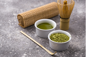 Matcha tea and bamboo whisk, a Food & Drink Photo by Yulia Furman