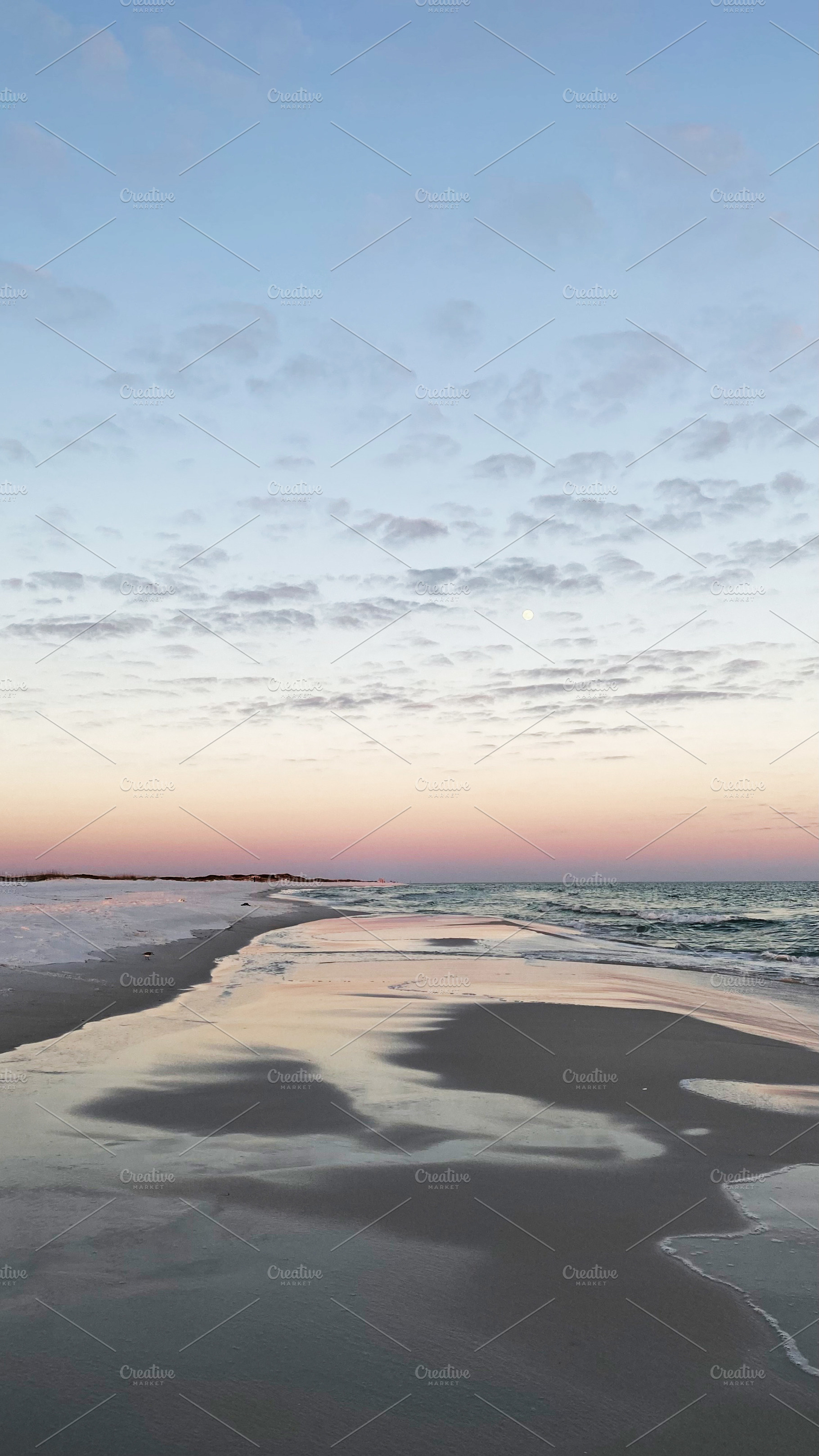 Serene Florida Pensacola beach at sunset with calm water and pastel sky over th, a Nature Photo by AS photostudio