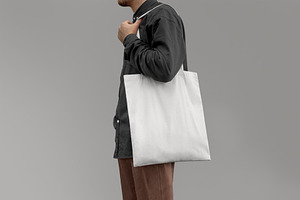 Man With White Tote Bag