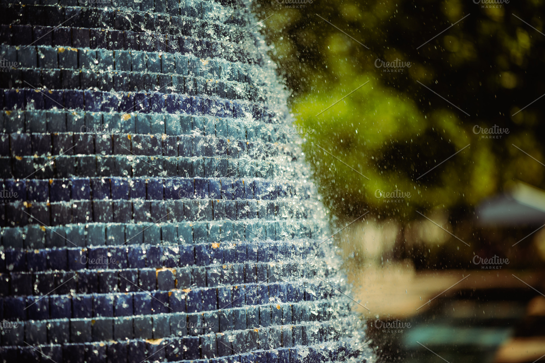 Water Cascading Down Tiled Fountain, an Architecture Photo by SkyNext