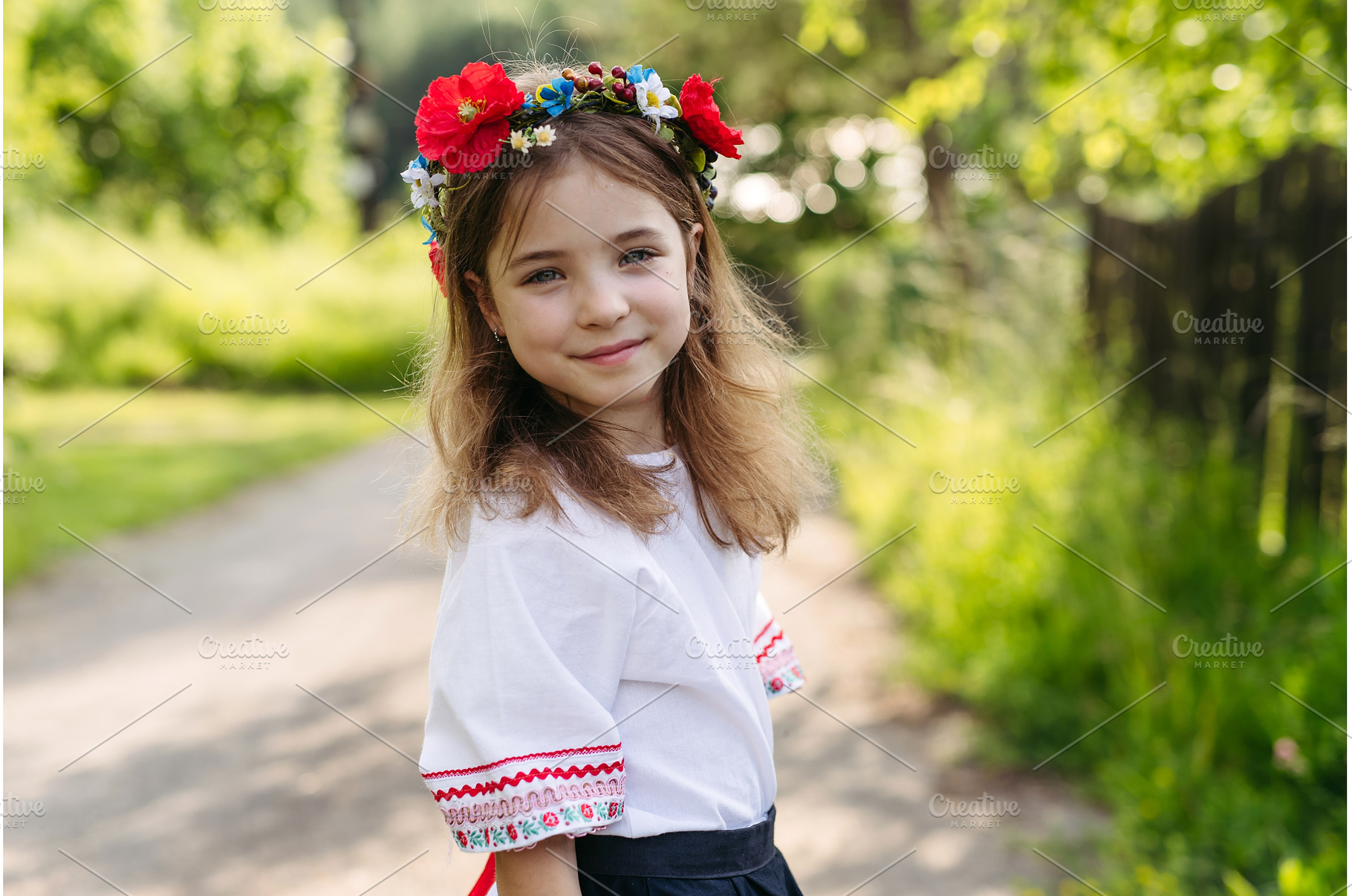 Young girl in folk costume, a Nature Photo by HalfPoint
