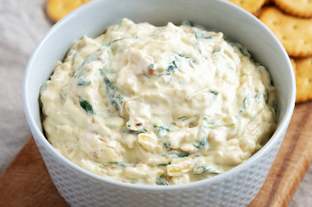 Homemade Caramelized Onion and Spinach Dip with Salty Round Crac, a Food & Drink Photo by LiudmylaChuhunova
