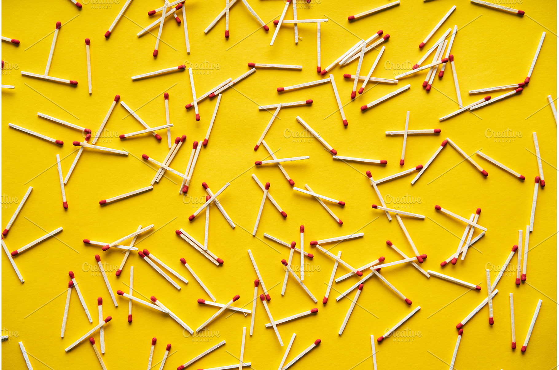 Wooden stick matches over yellow, an Abstract Photo by Gladkov photography