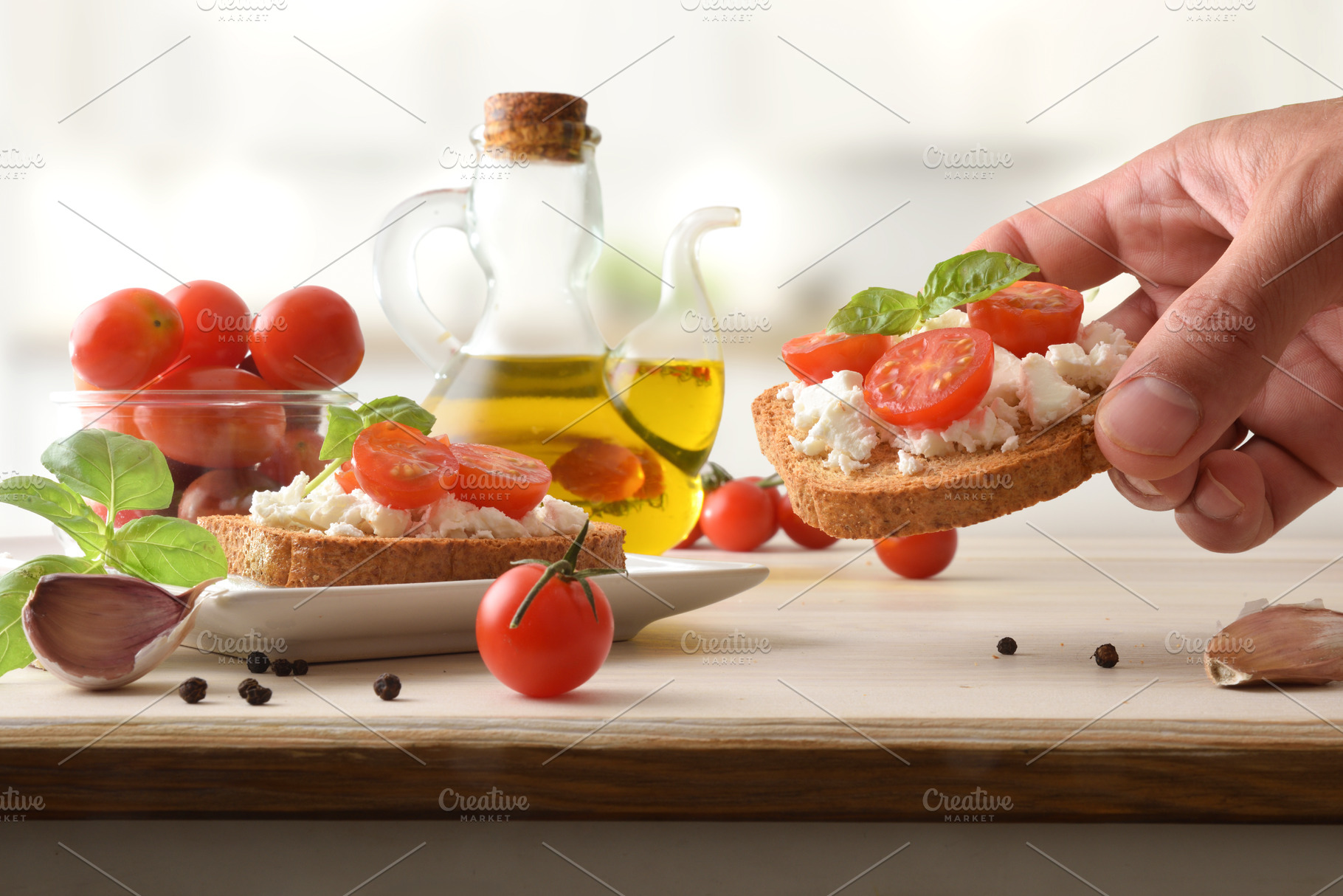 Hand Holding Tomato Ricotta Toast, a Food & Drink Photo by Davizro's Market