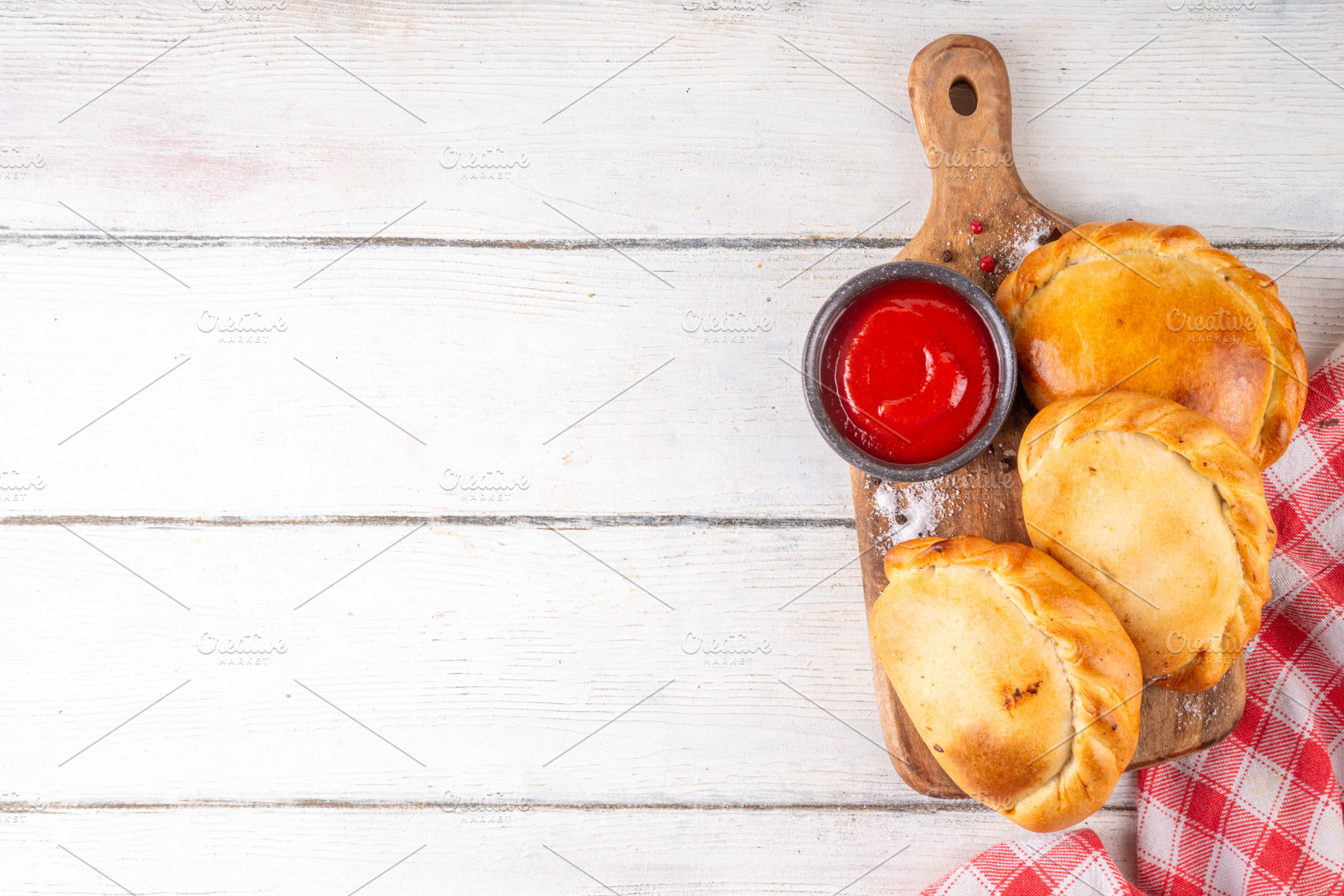 Homemade golden baked hand pies, with meat filling, a Food & Drink Photo by Rimma