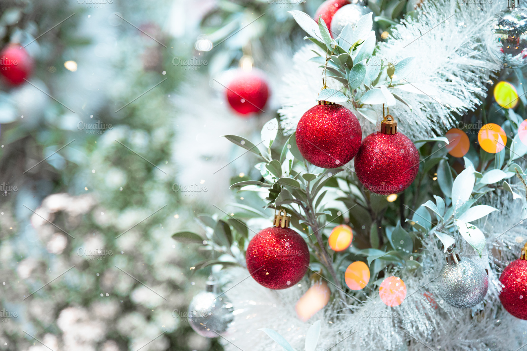 Christmas ornaments decorating on Christmas snowy tree. Merry Xm, a Holiday Photo by Ministocker