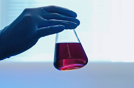 Chemical laboratory test technician hand flask, a Health & Medical Photo by Photo Drive Studio