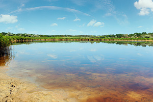 Summer iodine lake with a therapeutic effect thanks to the high, a Nature Photo by YuriyB